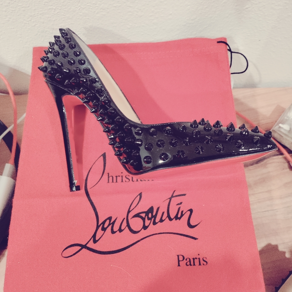 Christian Louboutin sexy black spiked, red bottoms heals